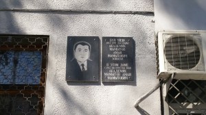 Plaque showing that scientist Aman Mamytov lived in this building from 1957-1999. Mamytov is best known for creating a new genre of investigating mountain soils.